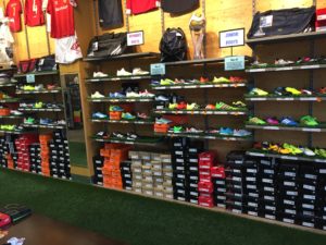 A store with many shoes on display.